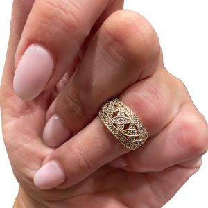 Solid 14K gold and pavé natural diamond ring.